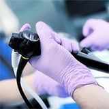 Gastroscopy + urease test (for Helicobacter Pylori) under local anaesthesia